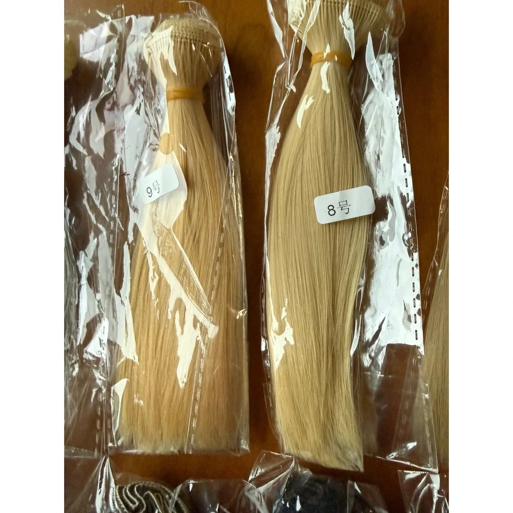 Doll hair wefts. Lot of 13